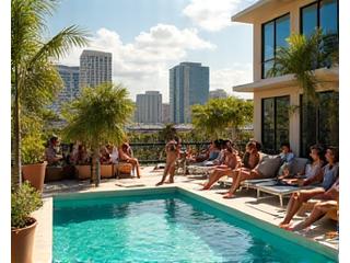 Residents enjoying a shared rooftop pool and lounge area